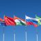 Waving,Flags,Of,The,Brics,Countries,Against,The,Blue,Sky.
