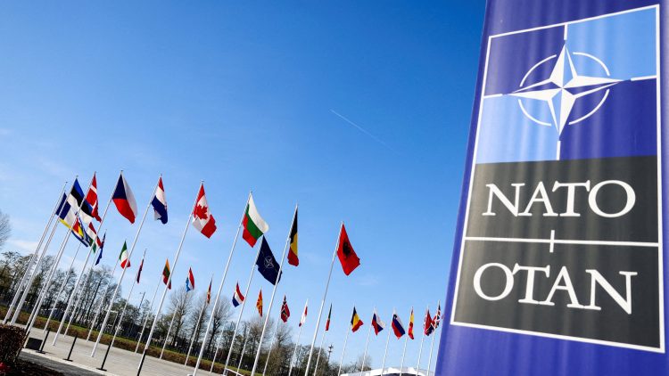 FILE PHOTO: Flags flutter at the NATO headquarters in Brussels